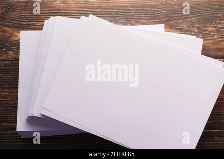 top view of stack of empty paper on table  Stock Photo