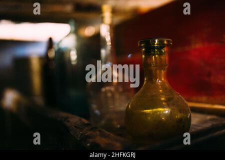 Antique medical bottle. Dark mystery halloween concept Stock Photo