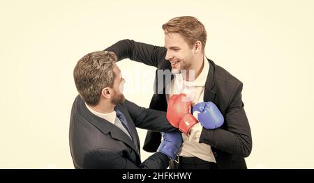 Employee and employer professional men fight with boxing gloves isolated on white, conflict Stock Photo