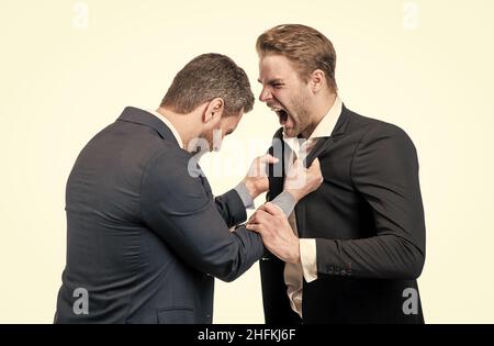 disagreed men business partners or colleague disputing while conflict, businessmen conflict. Stock Photo