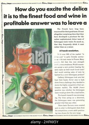 Cadbury Schweppes vintage paper advertisement schweppes in a can bottle with food 1980s 80s Stock Photo