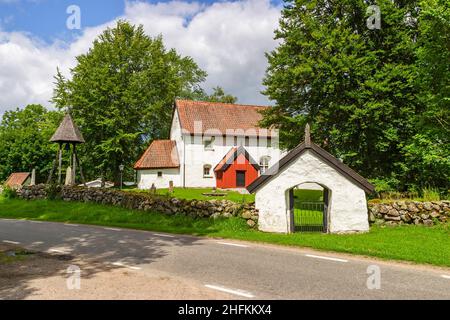 Old church by a country road in Sweden Stock Photo
