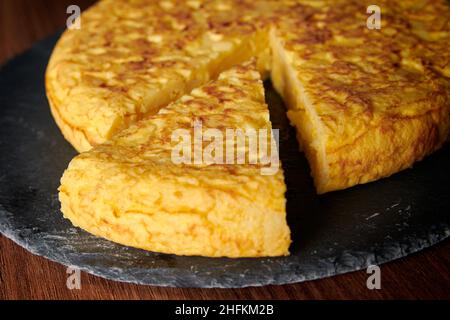 A closeup of a fresh tasty Spanish omelette, a traditional dish from Spain Stock Photo