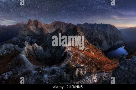 Mountain at night in Poland from Tatras peak Szpiglasowy wierch Stock Photo