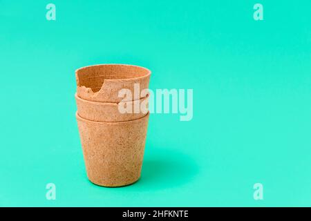 Eco-friendly waffle cups that can be eaten on green background with copy space Stock Photo