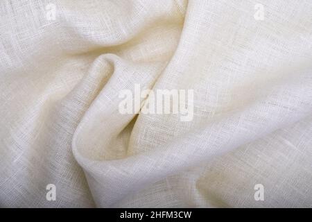 Wrinkled linen cloth folded napkins. Linen fabric texture. Concept of using natural eco-friendly materials Stock Photo