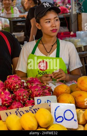 Thai woman selling fruits and vegetables in a street in Chiang Mai ...