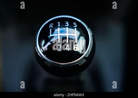 A car with a six speed transmission. Mechanical gear lever close up. Stock Photo