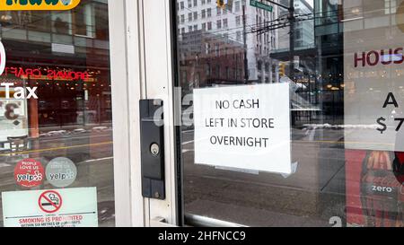 Vancouver, Canada - January 8,2022: View of sign No Cash Left in Store Overnight following an increase in break-and-enters in Gastown area Stock Photo