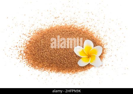 Coconut sugar with plumeria flower isolated on white background Stock Photo