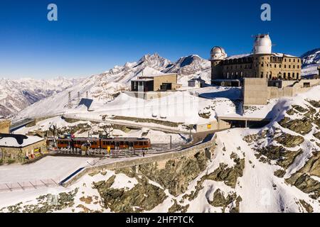 Aerial view of the famous Gornergrat ridge and train station in Zermatt in the alps in Switzerland on a sunny winter day Stock Photo