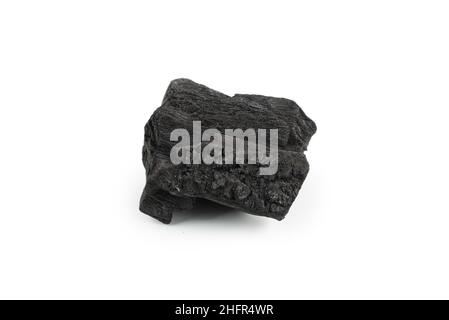 Black oak coal isolated on a white background. Stock Photo