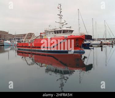 Hartlepool, UK - December 2021: A coastguard boat and other sailing boats in the harbour. Stock Photo