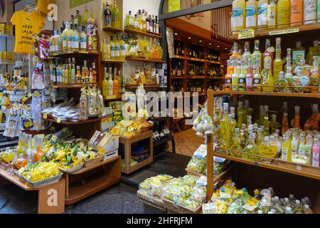 Sorrento, Italy - October 17 2021: Exterior view of a tourist shop that sells various citrus based goods and souvenirs such as the famous LImoncello l Stock Photo