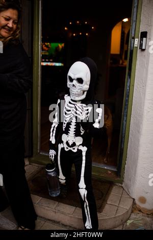 Six Year Old Dressed as a Skeleton for Halloween in San Diego Stock Photo