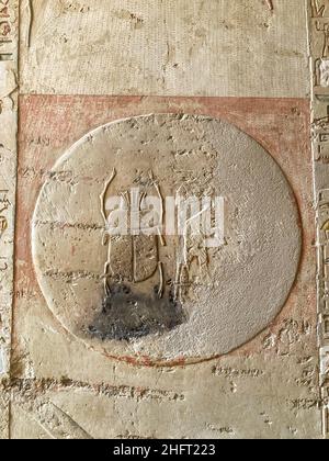 Drawings and hieroglyphs on the walls of the tomb of Merenptah in the Valley of the Kings near Luxor, Egypt. Drawing of scarab. Stock Photo