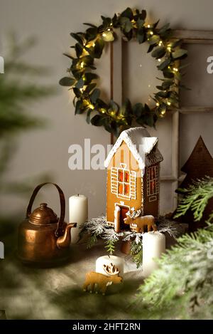 gingerbread house on the background of a window in winter decor Stock Photo