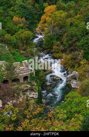 Bird's eye view of the Sagittarius river and the remains of the ancient mill near the hermitage of San Venanzio in Raiano. Raiano, Abruzzo Stock Photo