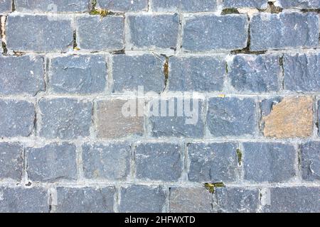 Ancient paving stone dark large stones texture Stock Photo