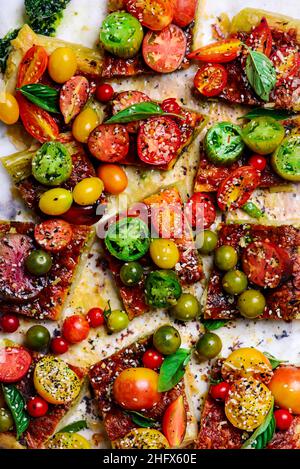 Cheese tomato and pesto  tart.style rustic.selective focus Stock Photo