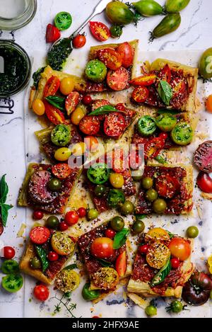 Cheese tomato and pesto  tart.style rustic.selective focus Stock Photo