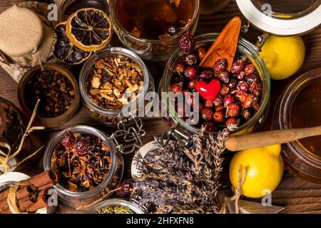 Herbal tea. Herbal harvest collection and bouquets of wild herbs. Alternative medicine. Natural pharmacy. Flu treatment. Stock Photo