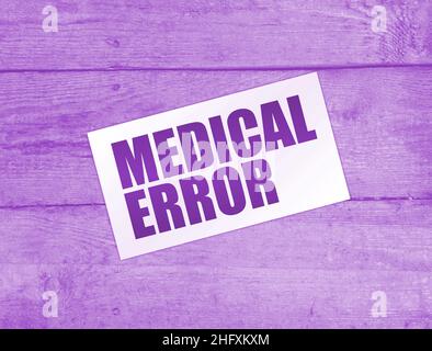 Blank Card With Text Medical Error On Wooden Background. Healthcare 