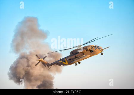 Military Rescue Helicopter in the Rescue mission Stock Photo