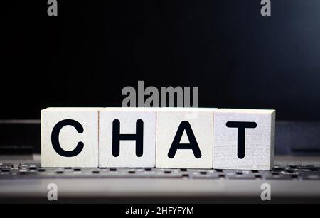 CHAT word made with wood building blocks Stock Photo
