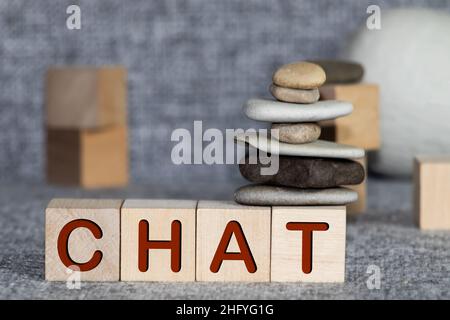 CHAT word made with wood building blocks Stock Photo