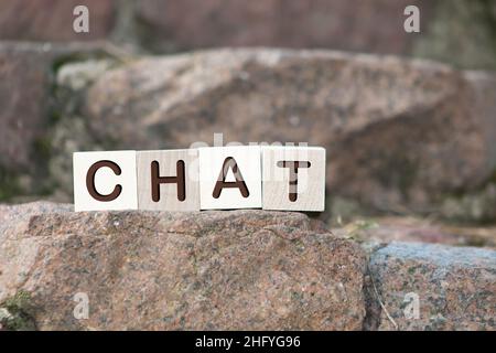 CHAT word made with wood building blocks Stock Photo