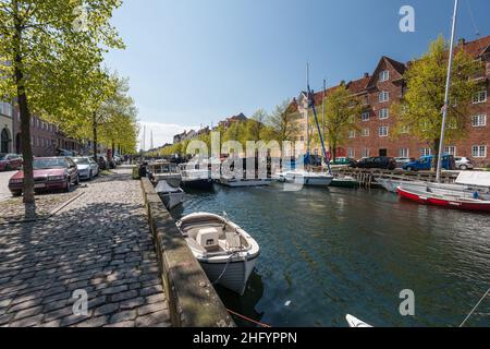 Copenhagen , Denmark - May 12 2017: View of the canal and its boats from Overgaden Oven Vandet.. Stock Photo