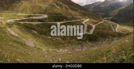 Serpentine road leading up to the Furka Pass in Grisons, Switzerland Stock Photo