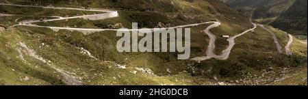 Serpentine road leading up to the Furka Pass in Grisons, Switzerland Stock Photo