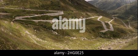 Serpentine road leading up to the Furka Pass in Grisons, Switzerland Stock Photo