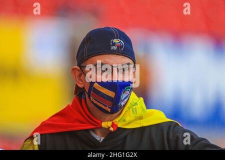 MAZATLAN, MEXICO - FEBRUARY 03:   Venezuelan fans supporting their team Caribes de Anzoátegui, during the game between Venezuela and Dominican Republic as part of Serie del Caribe 2021 at Teodoro Mariscal Stadium on February 3, 2021 in Mazatlan, Mexico. (Photo by Luis Gutierrez/Norte Photo). Face mask, cape, LVBP, glasses, cap,Cubrebocas, capa, LVBP, lentes, gorra Stock Photo