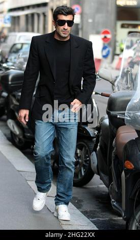 Luis Figo with daughter and wife Helen Svedin shopping in Milan. Stock Photo