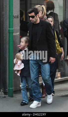 Luis Figo with daughter and wife Helen Svedin shopping in Milan. Stock Photo