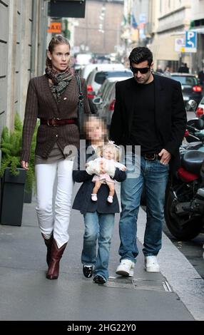 Luis Figo with daughter and wife Helen Svedin shopping in Milan. Stock Photo