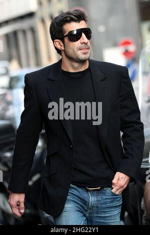 Luis Figo with daughter and wife Helen Svedin shopping in Milan. Stock Photo