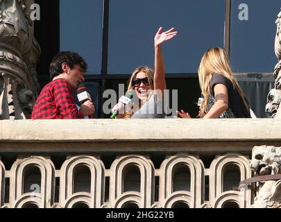 Carmen Electra on the TV show TRL (Total Request Live) being filmed on the balcony of Duomo square, Milan. Stock Photo