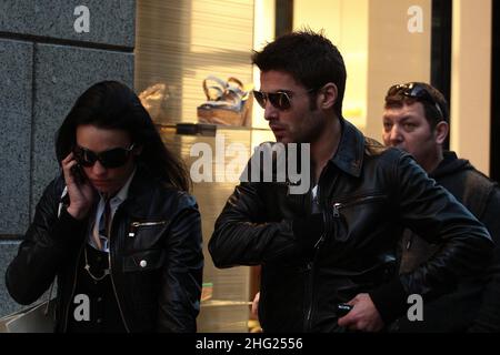 Footballer Adrian Mutu and his wife Consuelo spotted shopping in Milan, Italy. Stock Photo