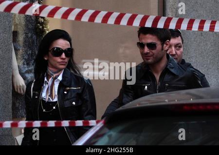 Footballer Adrian Mutu and his wife Consuelo spotted shopping in Milan, Italy. Stock Photo