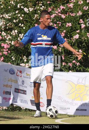 Federico Macheda takes part in a football game whilst on holiday with friends in Porto Cervo, northern Sardinia. Stock Photo