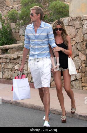 Peter Crouch and girlfriend Abigail Clancy out shopping whilst on holiday in PortoCervo, Sardinia. Stock Photo