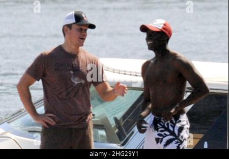 Matt Damon and fellow Ocean's Eleven actor Don Cheadle on holiday as guests at George Clooney's villa in Laglio, Lake Como, Italy. Stock Photo