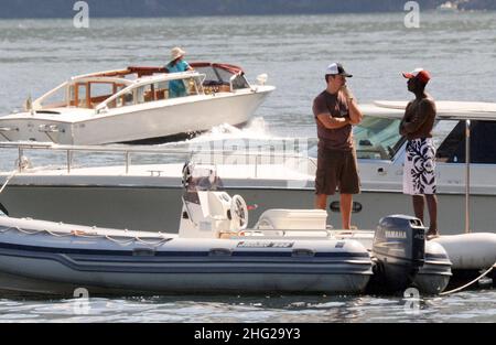 Matt Damon and fellow Ocean's Eleven actor Don Cheadle on holiday as guests at George Clooney's villa in Laglio, Lake Como, Italy. Stock Photo