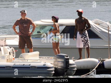 Matt Damon with wife and daughter and fellow Ocean's Eleven actor Don Cheadle on holiday as guests at George Clooney's villa in Laglio, Lake Como, Italy. Stock Photo