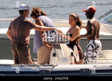 Matt Damon with wife and daughter and fellow Ocean's Eleven actor Don Cheadle on holiday as guests at George Clooney's villa in Laglio, Lake Como, Italy. Stock Photo