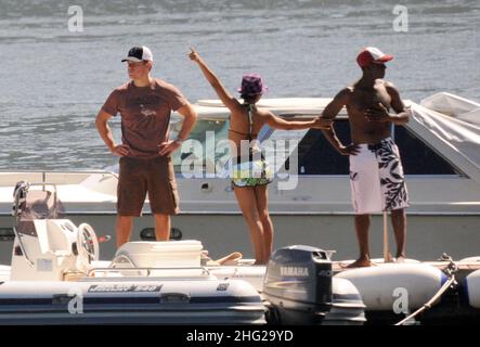 Matt Damon with wife and daughter and fellow Ocean's Eleven actor Don Cheadle on holiday as guests at George Clooney's villa in Laglio, Lake Como, Italy. Stock Photo